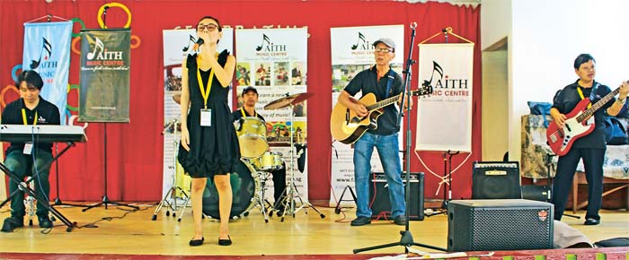 Members from the Visually Impaired Band performing in front of elderly residents at St  Theresa’s Home.